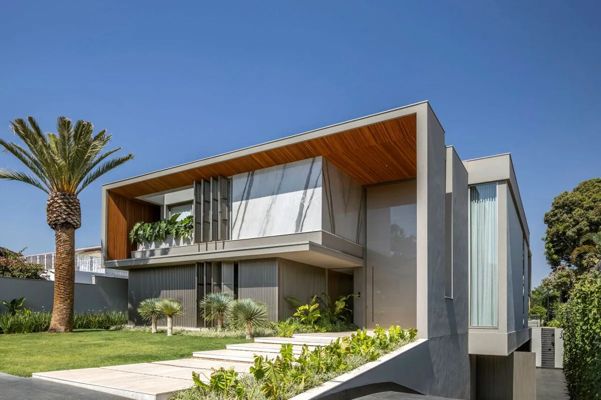 5 experiências incríveis para você amar viver nesta casa:1. Arquitetura que vest...