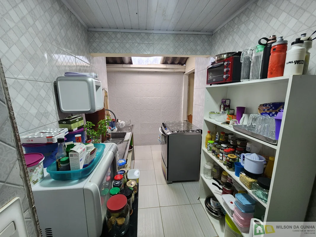 Casa com 3 quartos sendo 1 suíte em lote de 200m2 com Casa de 2 quartos nos fund...