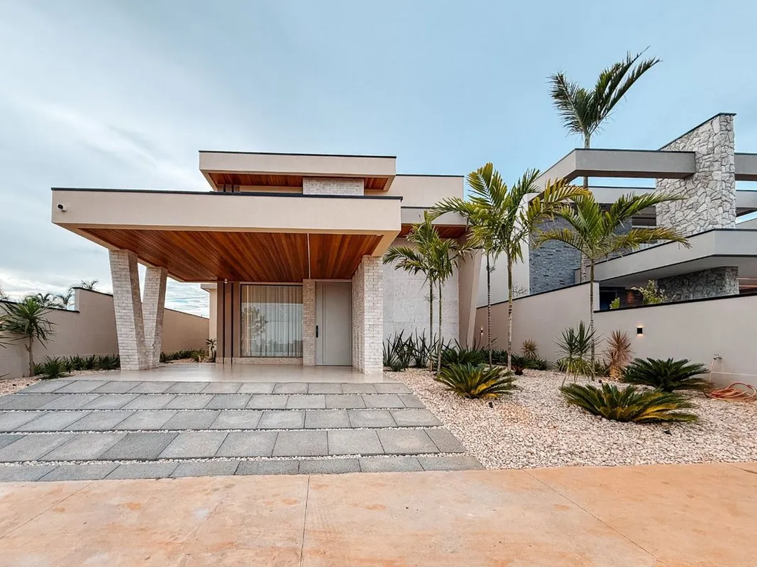 Casa Jardins Arquitetura moderna e conforto para viver bemno condomínio Condomín...