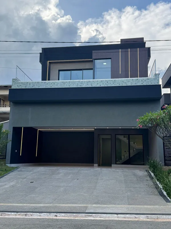 rea Pavimento Térreo – Garagem, hall de entrada Área 2º Pavimento – 3 Suítes – 8...