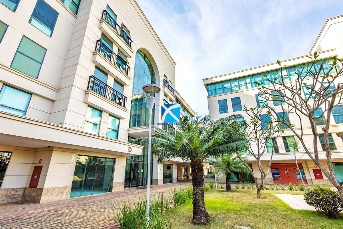 Imobiliária Brasília vende excelente sala térrea no Ed. The Union com vaga de ga...
