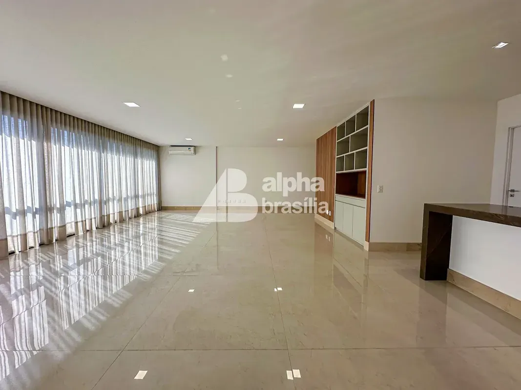 Este elegante apartamento de canto no Edifício Turmalina foi projetado para aten...