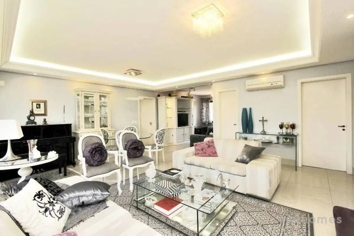 Apartamento à venda no bairro Auxiliadora3 dormitórios (1 suíte)Living para dois...