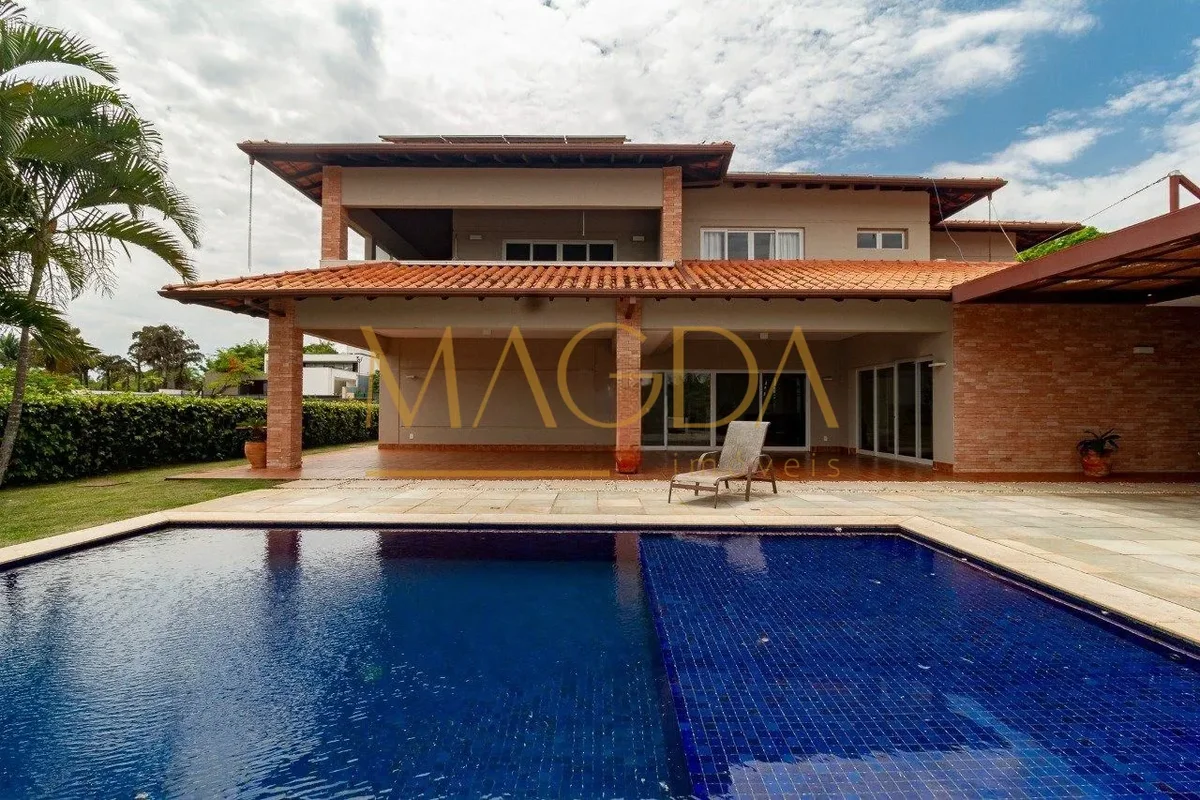 Lago Sul com 4 suítes, piscina aquecida, energia solar, área gourmet e quadra de...